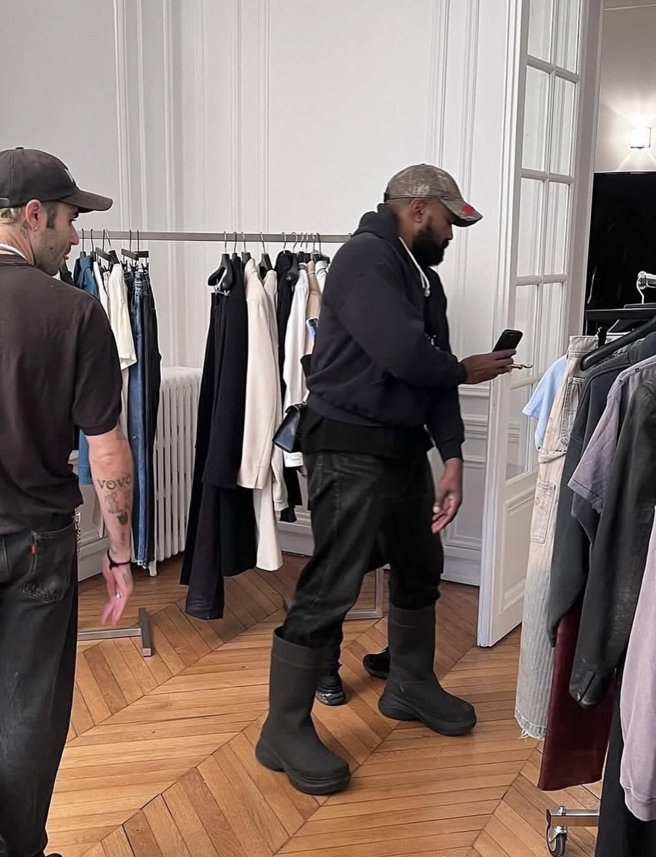 Levy and Ye in a showroom.
