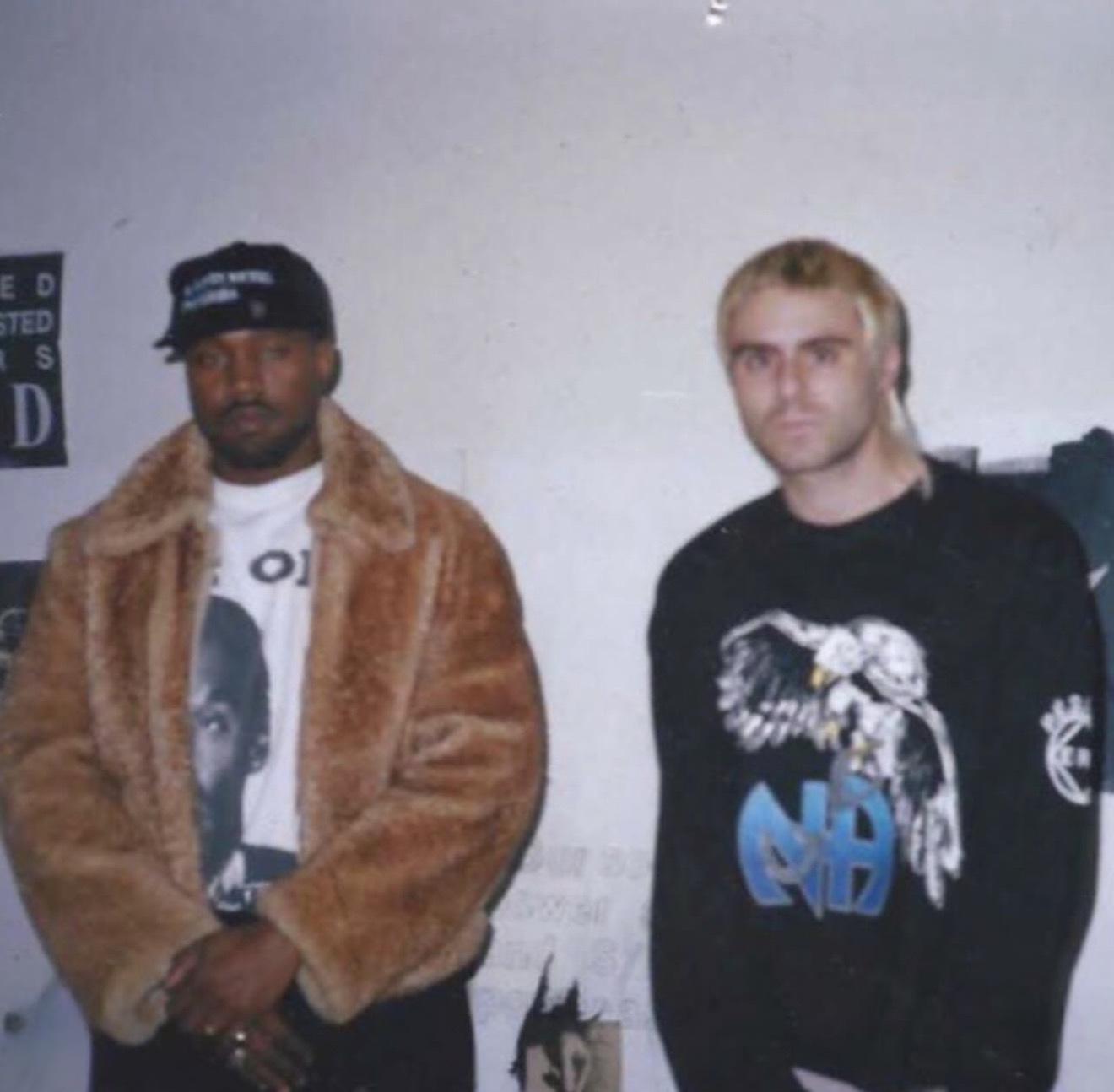 Levy photographed with Ye.